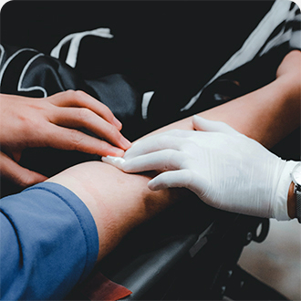 Close Up Of Arm Donating Blood